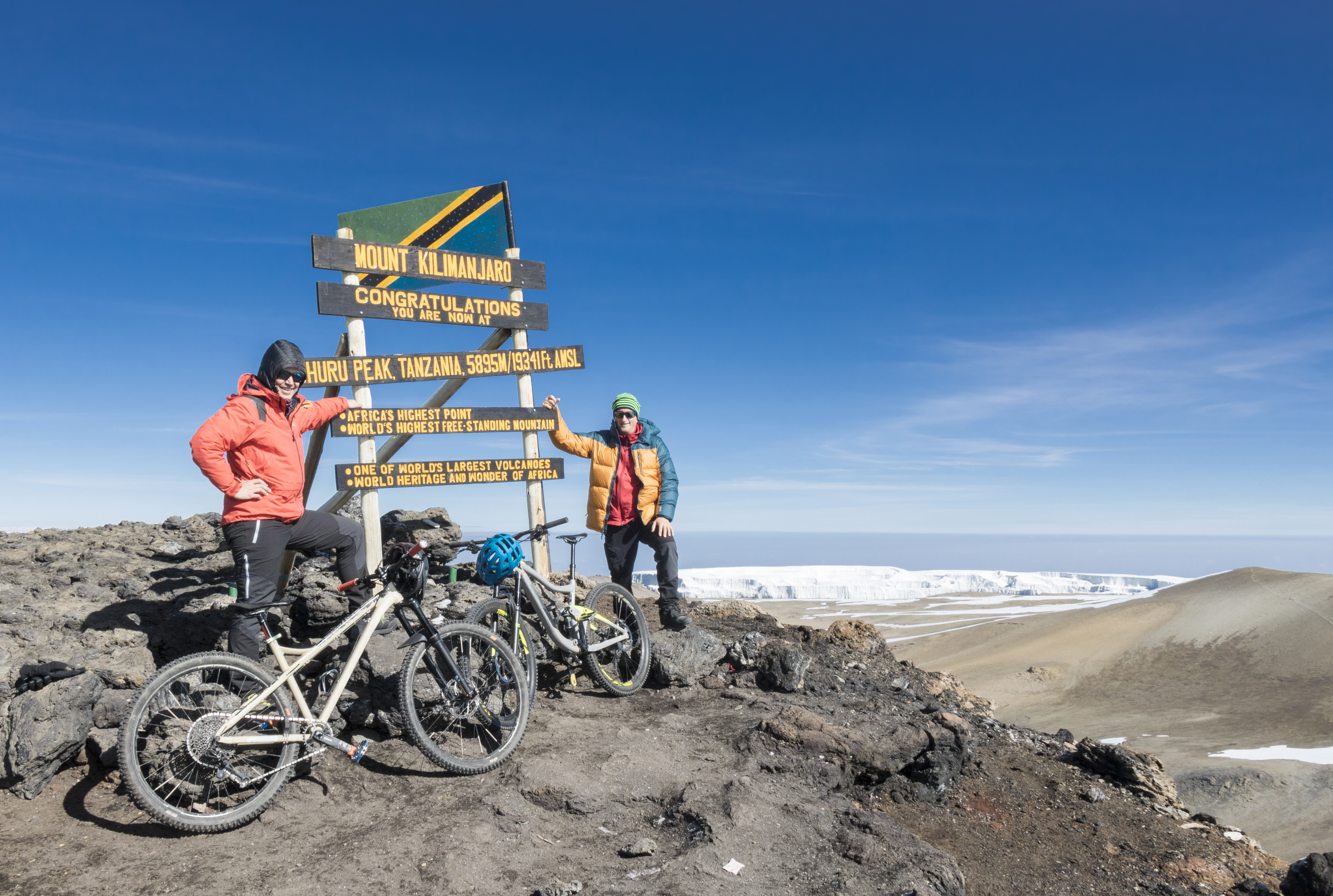 A mountain biker at the edge of the caldera of Mt. Kilimanjaro.