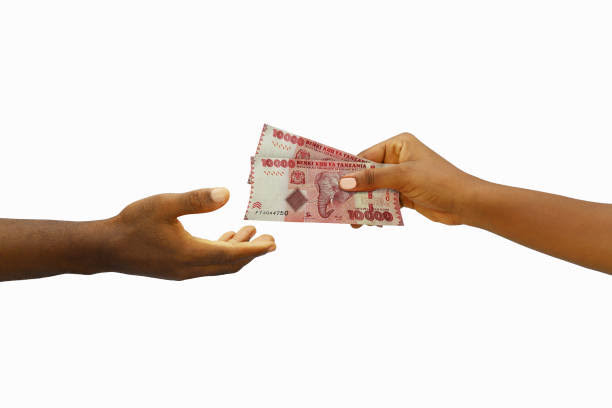 Tourist Exchanging Currency at a Licensed Bureau